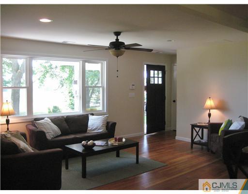 211 Lambertson Road Old Bridge, NJ 07747 - Photo 3 of 19 a living room with furniture and a large window