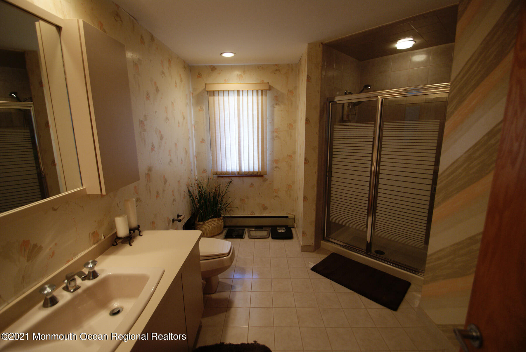 106 Oceanfront Lavallette, NJ 08735 - Photo 17 of 20 a bathroom with a tub a sink and shower