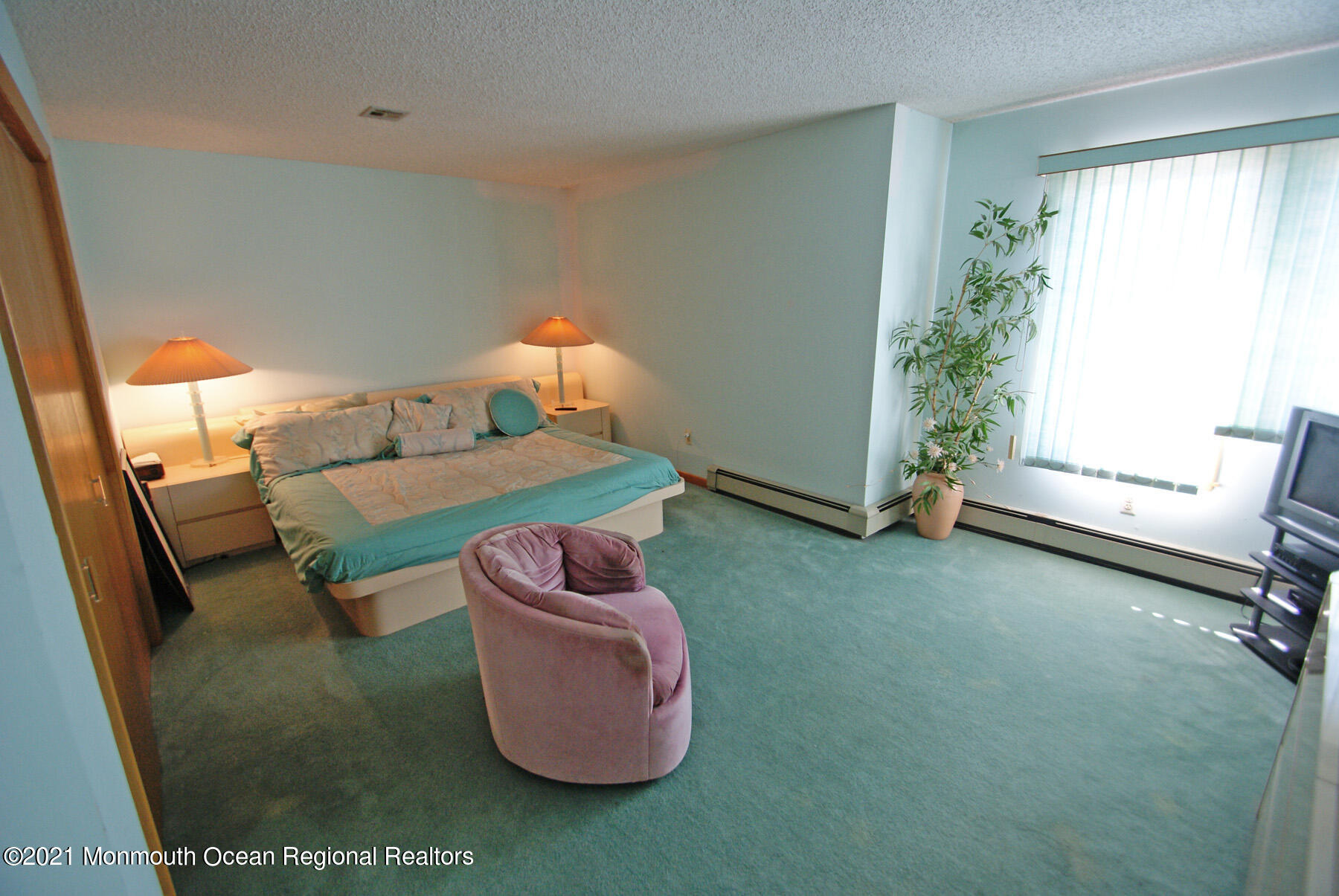 106 Oceanfront Lavallette, NJ 08735 - Photo 18 of 20 a bedroom with furniture and a window