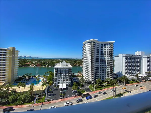 a view of a city with tall buildings