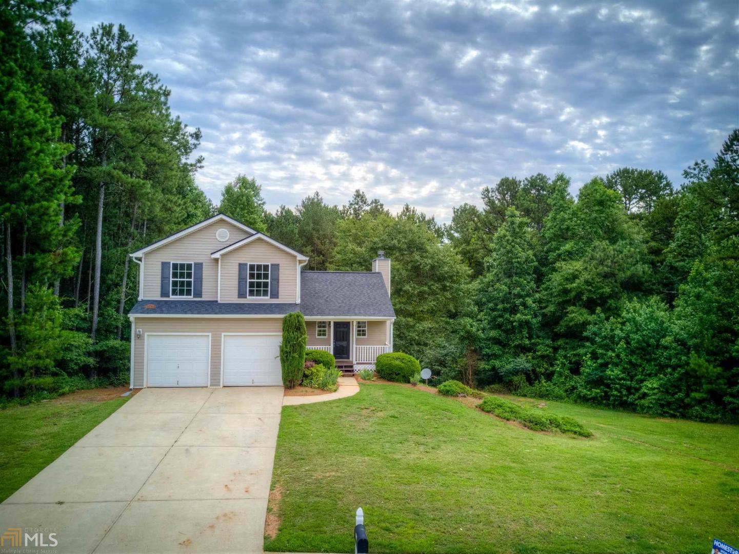 1433 Apalachee Falls Road Monroe, GA 30656 - Photo 1 of 1 a front view of a house with a yard
