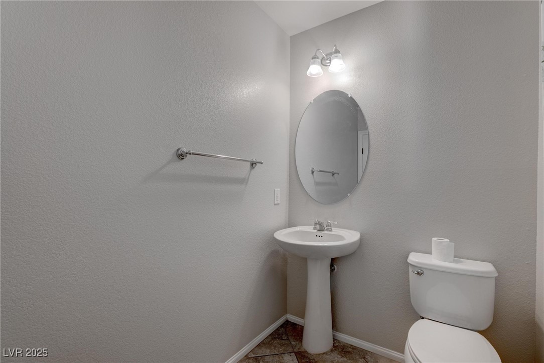 10273 Aragon Crown Road Las Vegas, NV 89135 - Photo 6 of 45 Bathroom with baseboards and light tile patterned floors