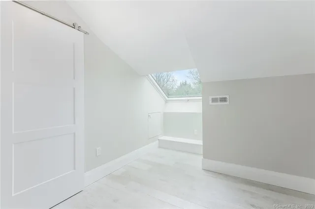 a picture of a park with an bench