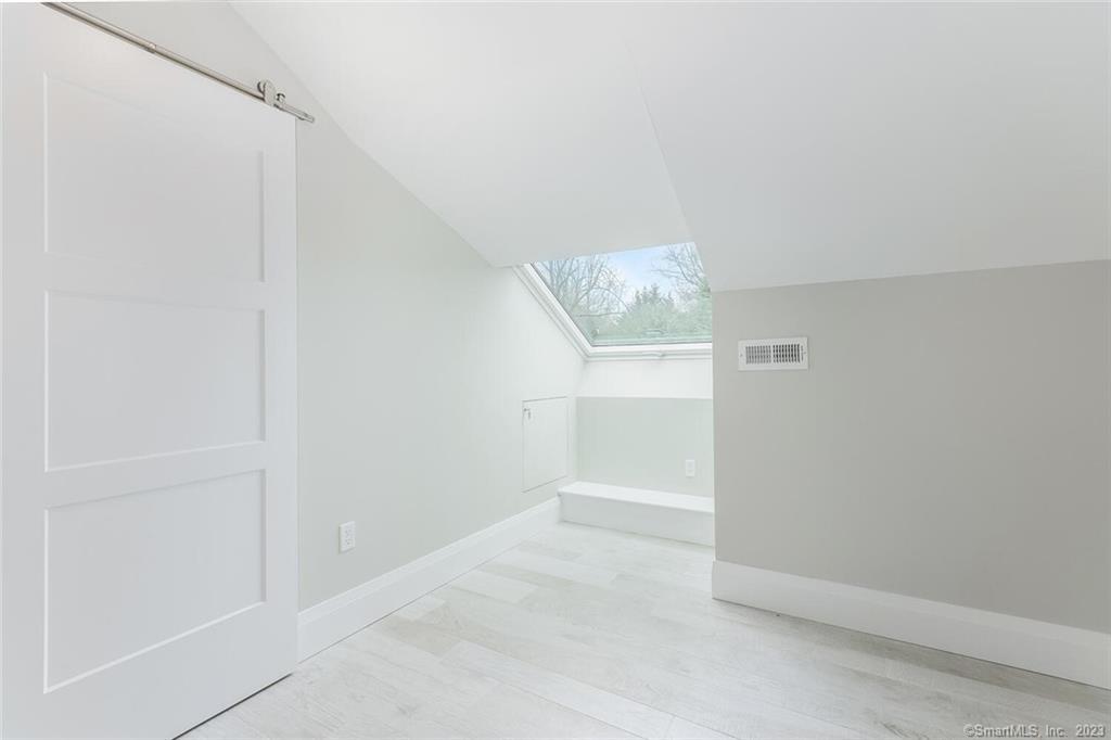 1990 Bronson Road, Unit 8 Fairfield, CT 06824 - Photo 20 of 28 a view of an empty room