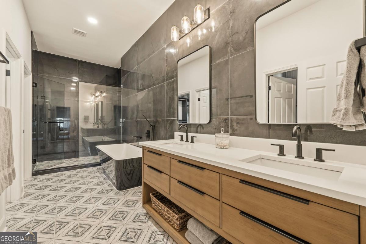121 Mags Path Eatonton, GA 31024 - Photo 25 of 74 a bathroom with a sink a toilet and shower