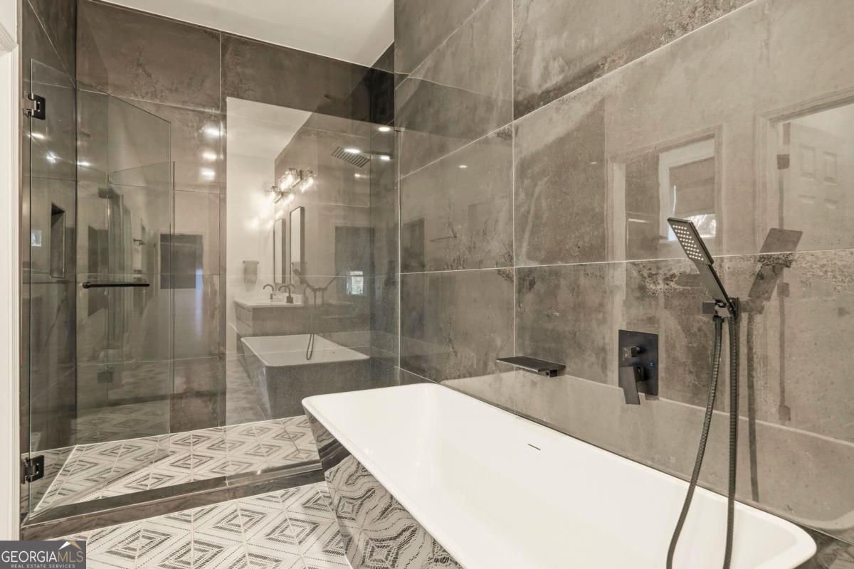 121 Mags Path Eatonton, GA 31024 - Photo 26 of 74 a bathroom with a sink and shower