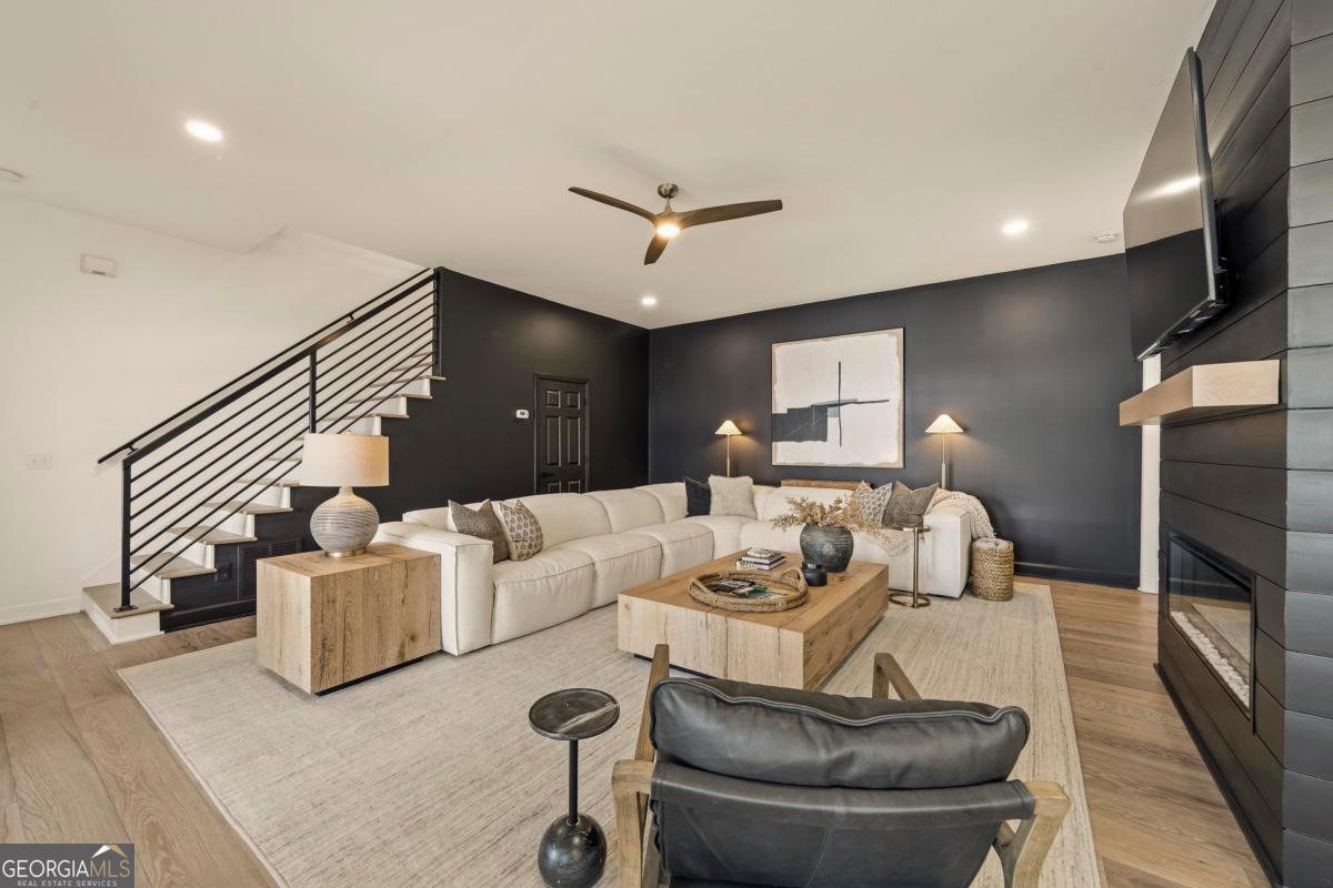 121 Mags Path Eatonton, GA 31024 - Photo 40 of 74 a living room with furniture and a flat screen tv