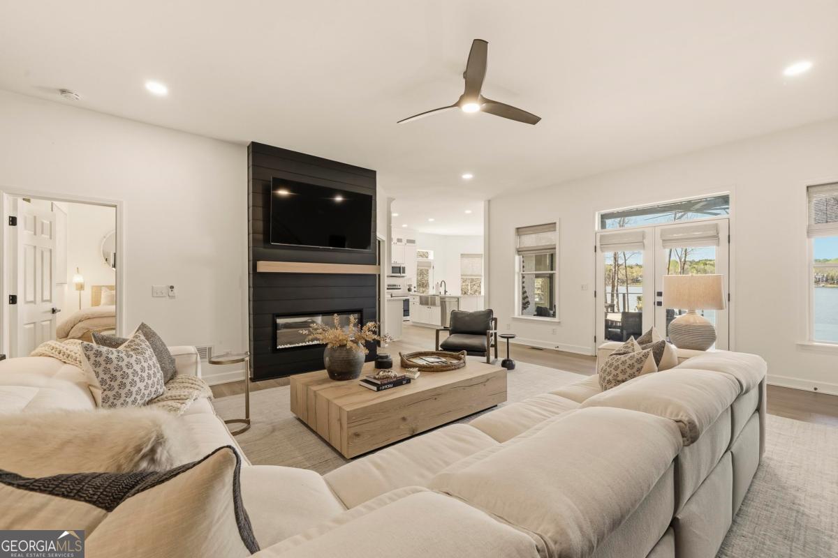 121 Mags Path Eatonton, GA 31024 - Photo 41 of 74 a living room with furniture and a flat screen tv