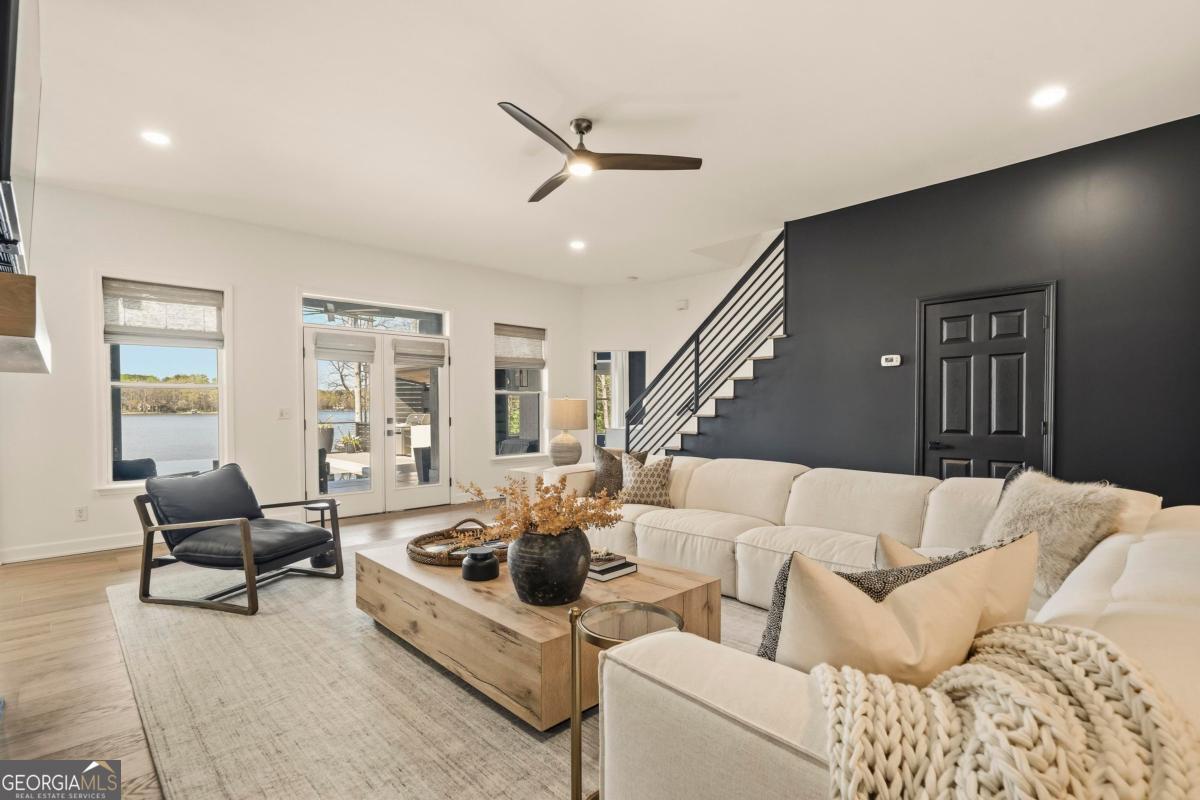 121 Mags Path Eatonton, GA 31024 - Photo 42 of 74 a living room with furniture and a large window