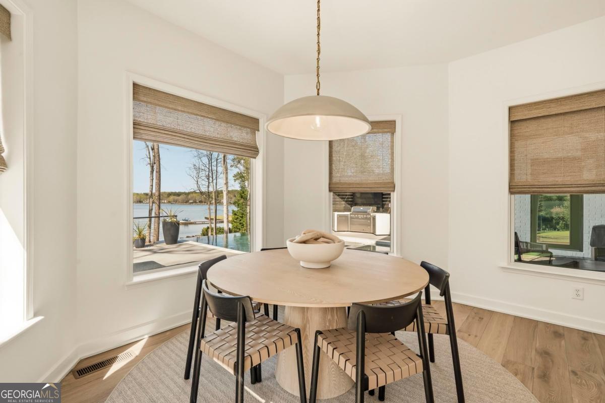121 Mags Path Eatonton, GA 31024 - Photo 47 of 74 a view of a dining room with furniture window and outside view