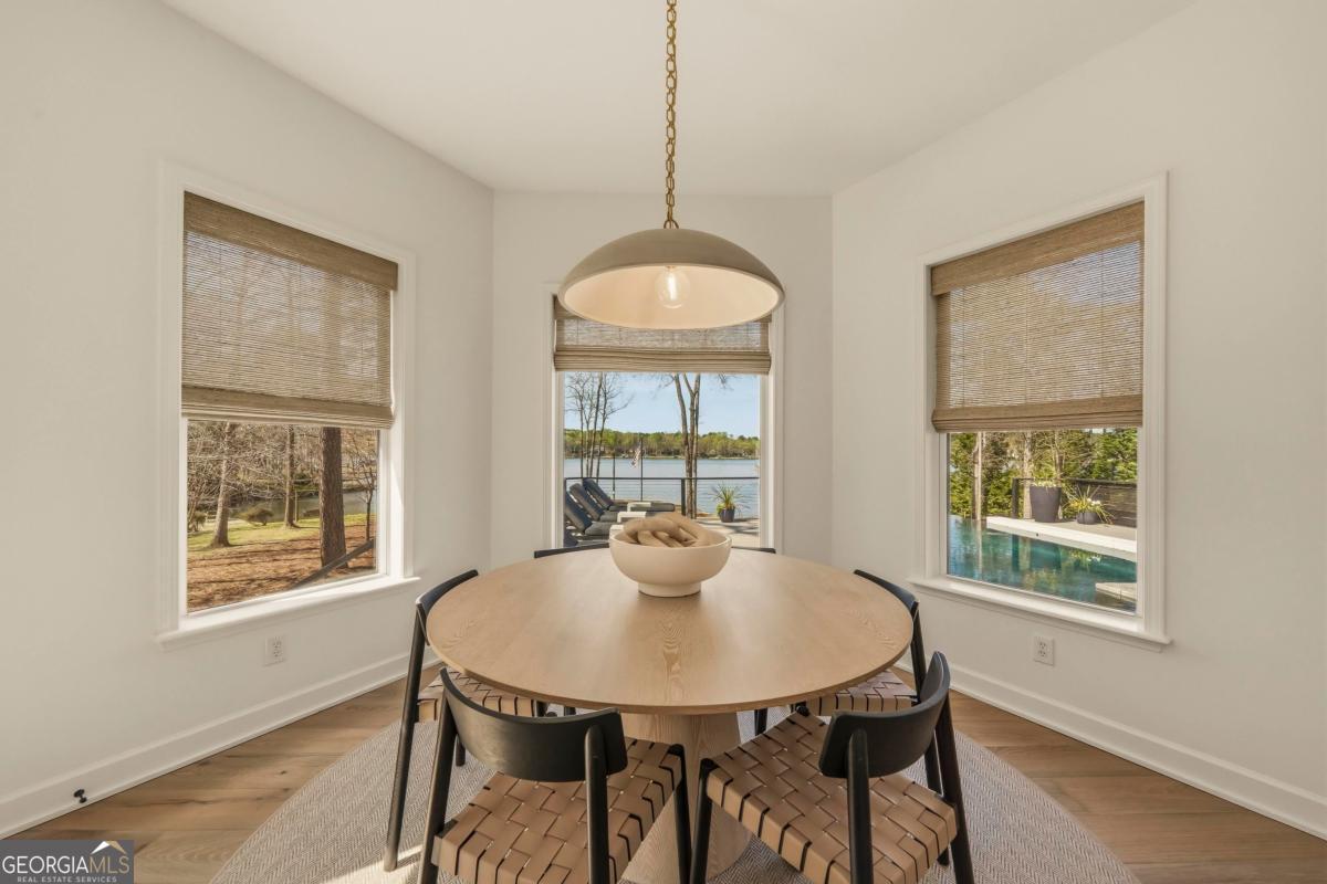 121 Mags Path Eatonton, GA 31024 - Photo 48 of 74 a view of a dining room with furniture window and outside view