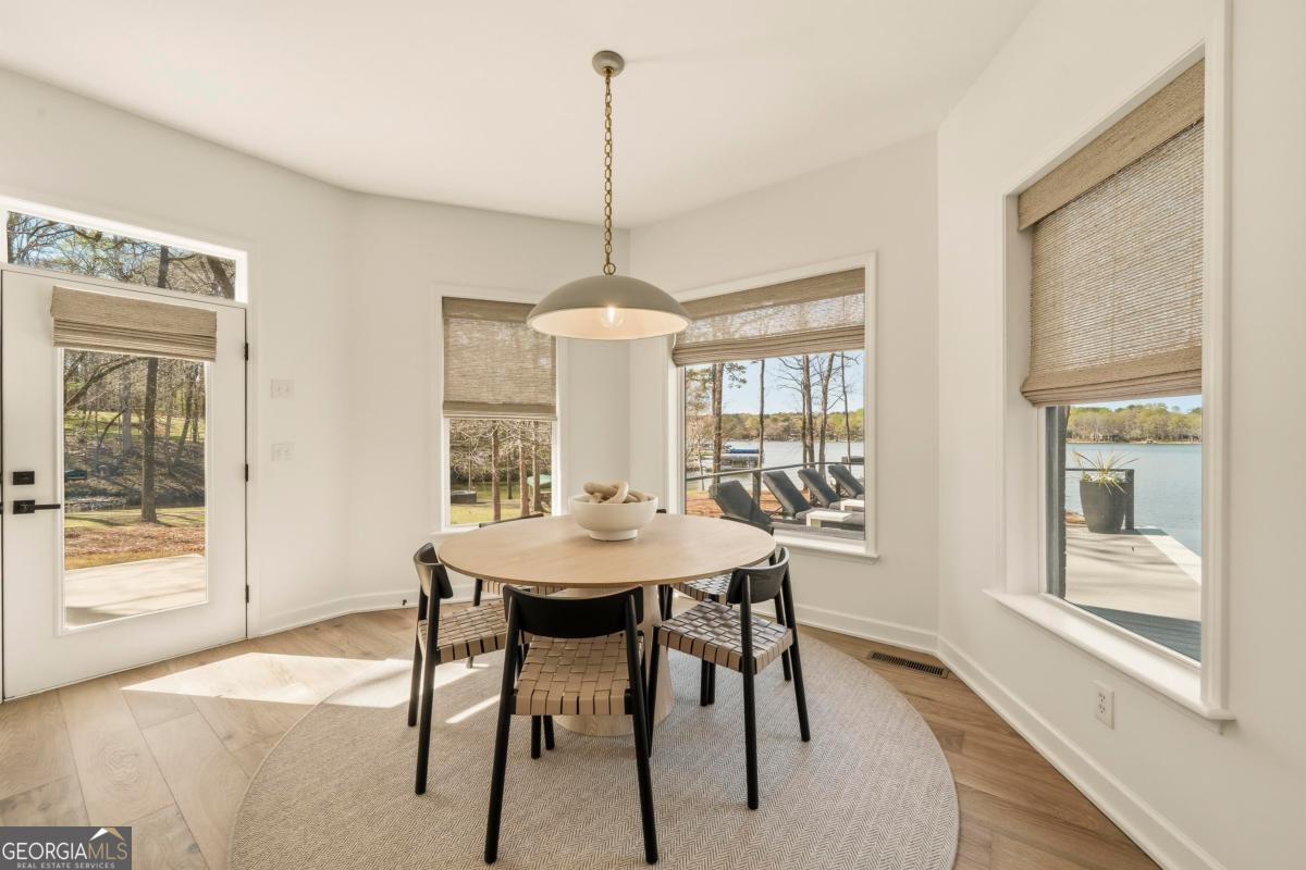 121 Mags Path Eatonton, GA 31024 - Photo 49 of 74 a view of a dining room with furniture window and outside view
