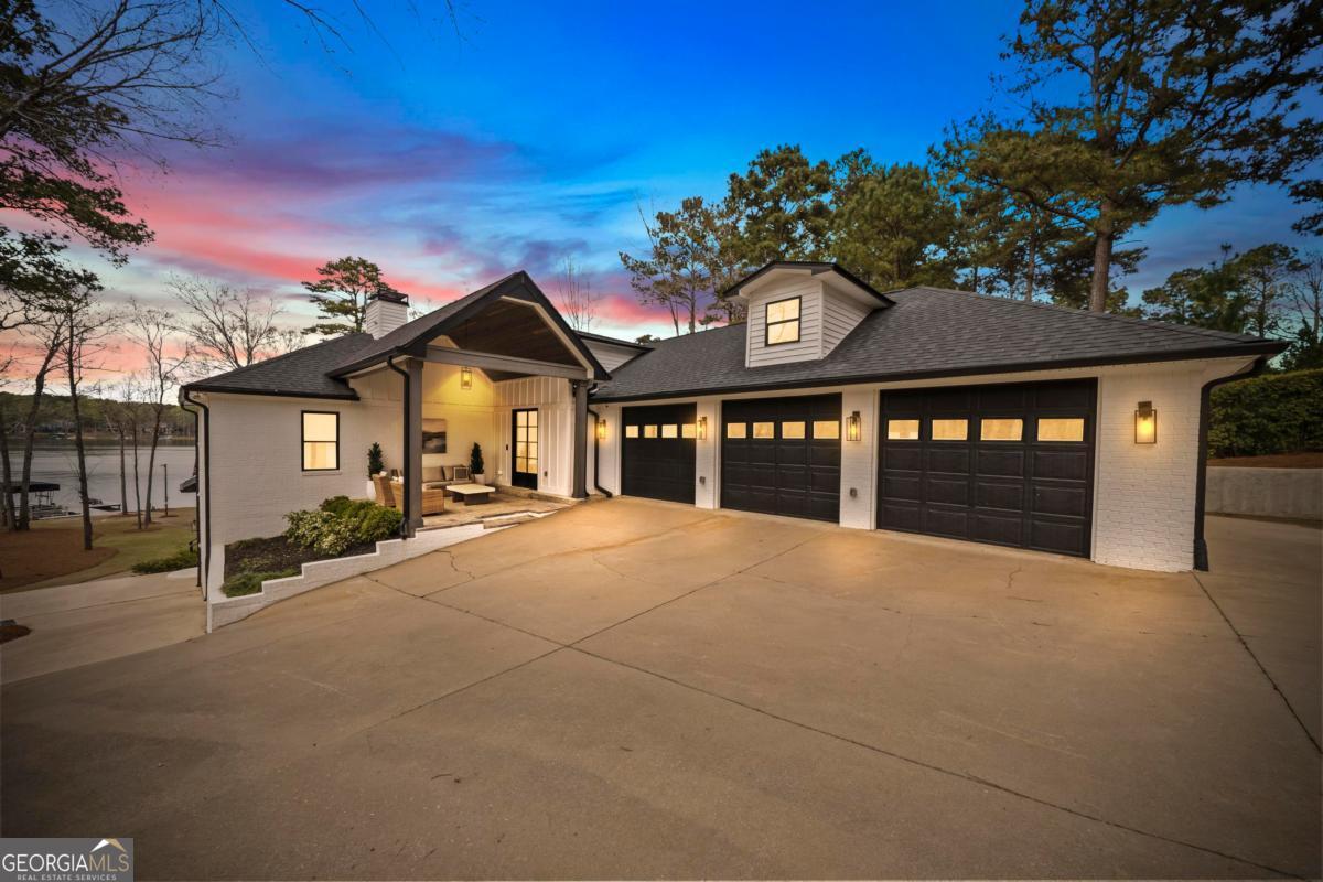 121 Mags Path Eatonton, GA 31024 - Photo 5 of 74 a front view of a house with a yard
