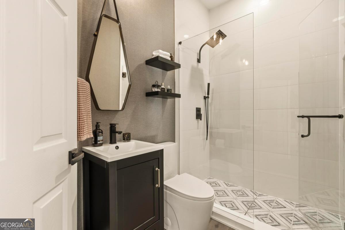 121 Mags Path Eatonton, GA 31024 - Photo 53 of 74 a bathroom with a sink toilet and shower