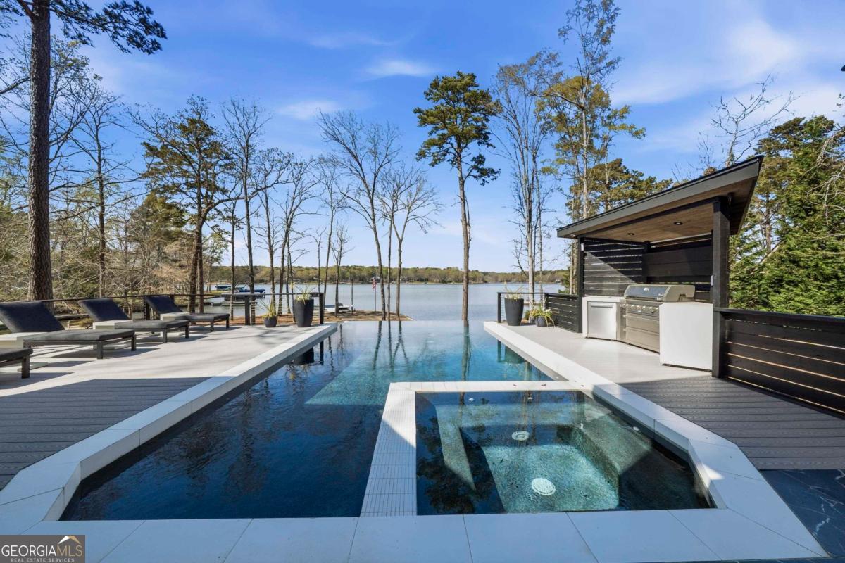 121 Mags Path Eatonton, GA 31024 - Photo 59 of 74 a view of a swimming pool with outdoor seating