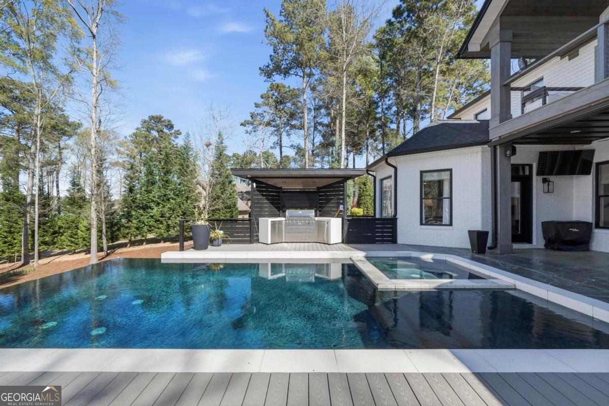 121 Mags Path Eatonton, GA 31024 - Photo 60 of 74 a view of a house with a swimming pool