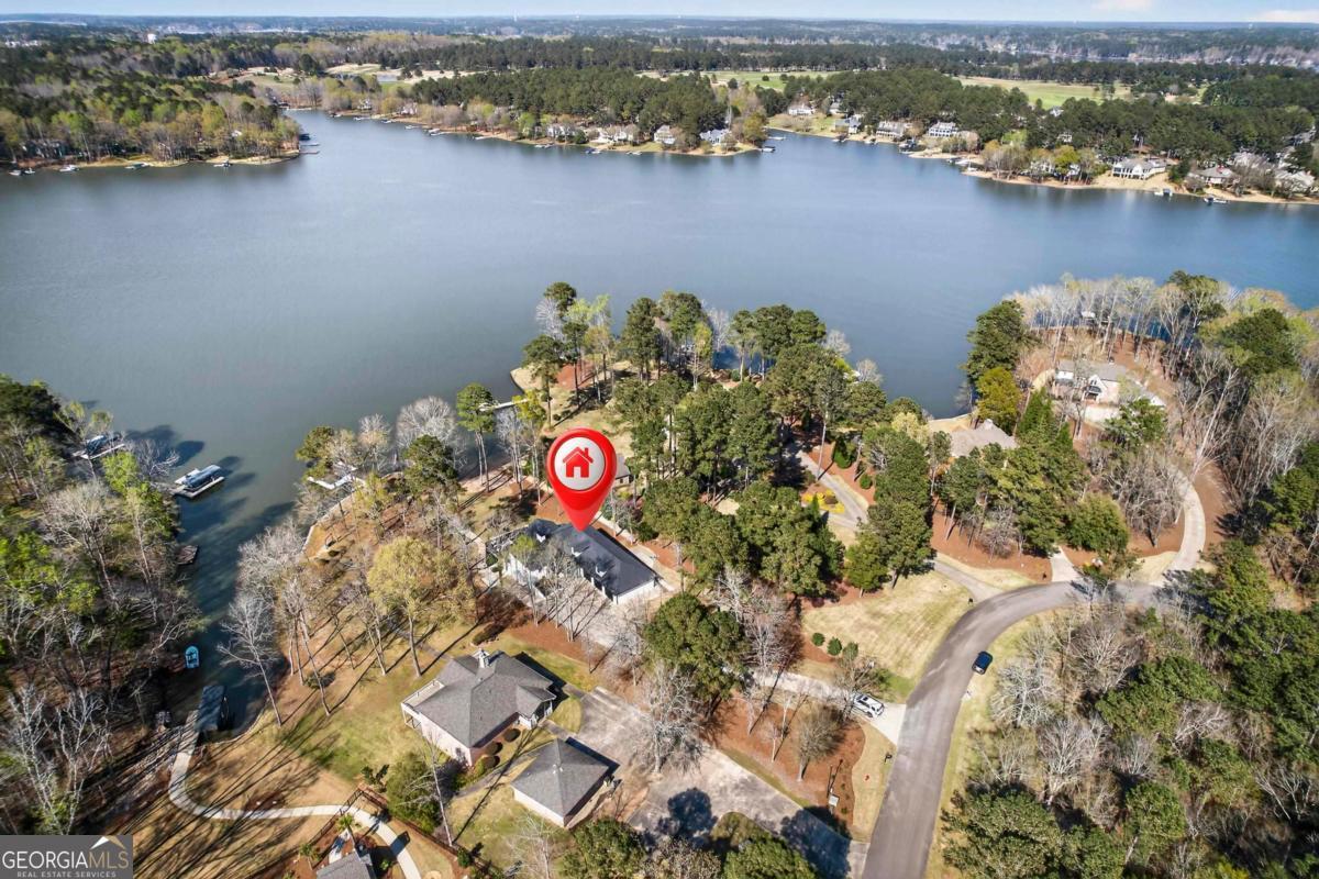 121 Mags Path Eatonton, GA 31024 - Photo 68 of 74 an aerial view of a houses with a lake view