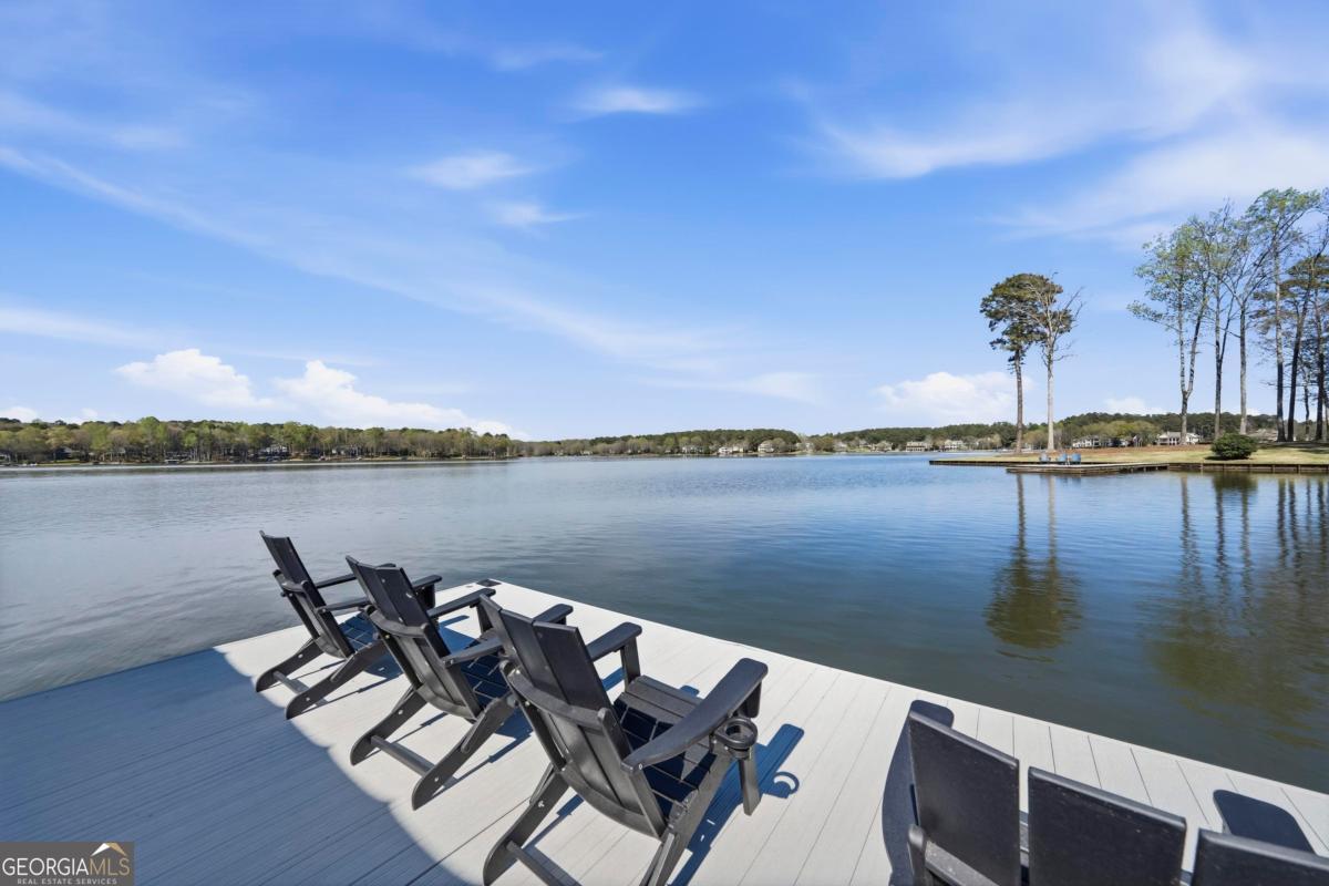 121 Mags Path Eatonton, GA 31024 - Photo 72 of 74 a view of a lake with outdoor seating