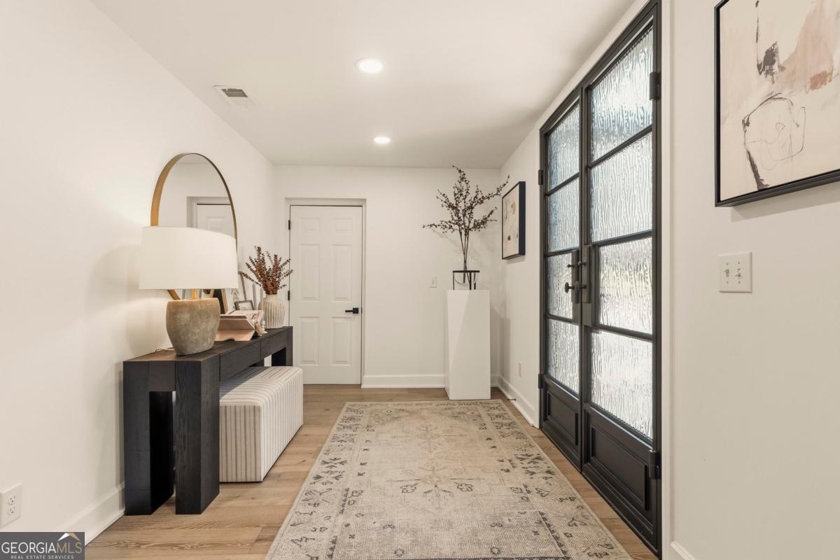 121 Mags Path Eatonton, GA 31024 - Photo 9 of 74 a view of a bathroom with a sink and mirror