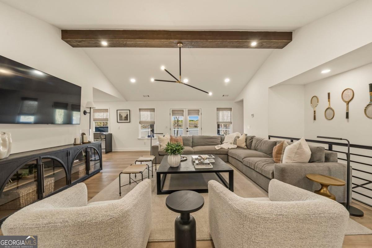 121 Mags Path Eatonton, GA 31024 - Photo 10 of 74 a living room with furniture and a flat screen tv
