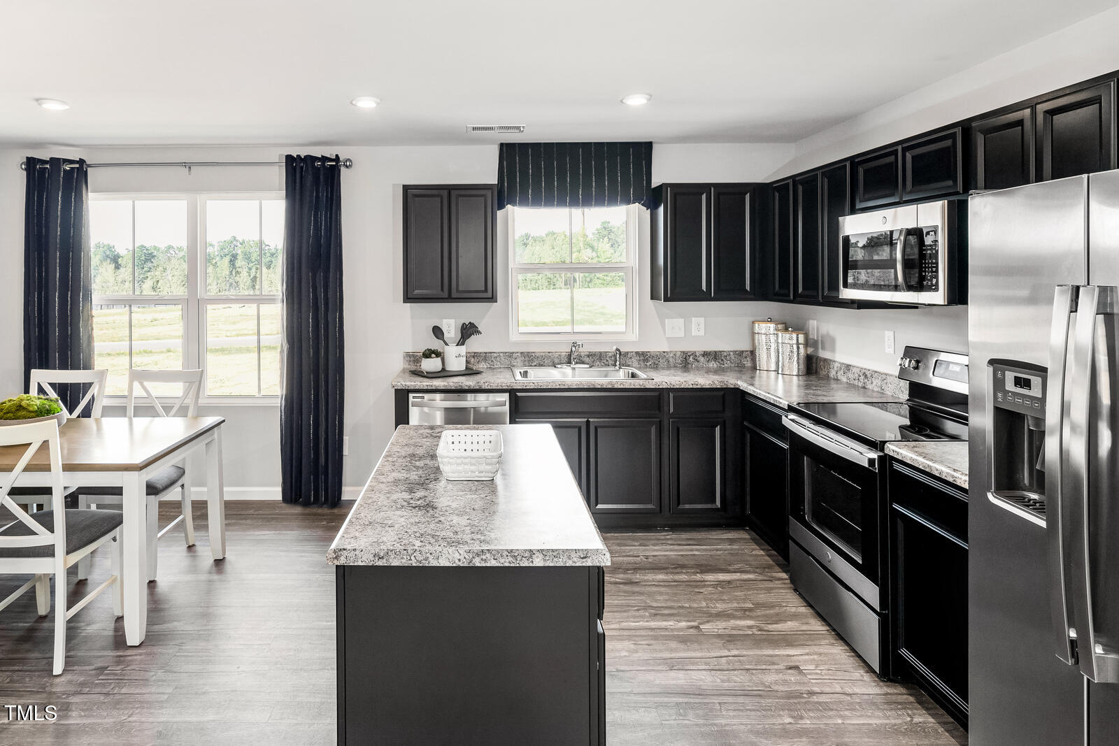 304 Grand Silo Road Raleigh, NC 27603 - Photo 5 of 15 Kitchen and Dining