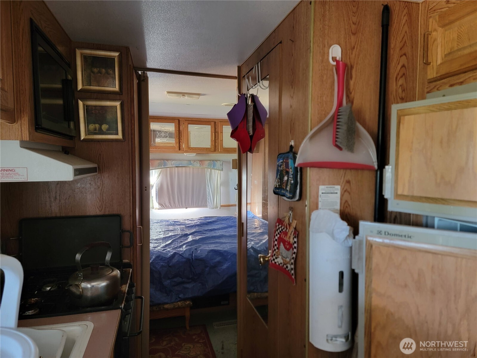 0 Mule Deer Road Republic, WA 99166 - Photo 20 of 23 a living room with furniture and a fireplace