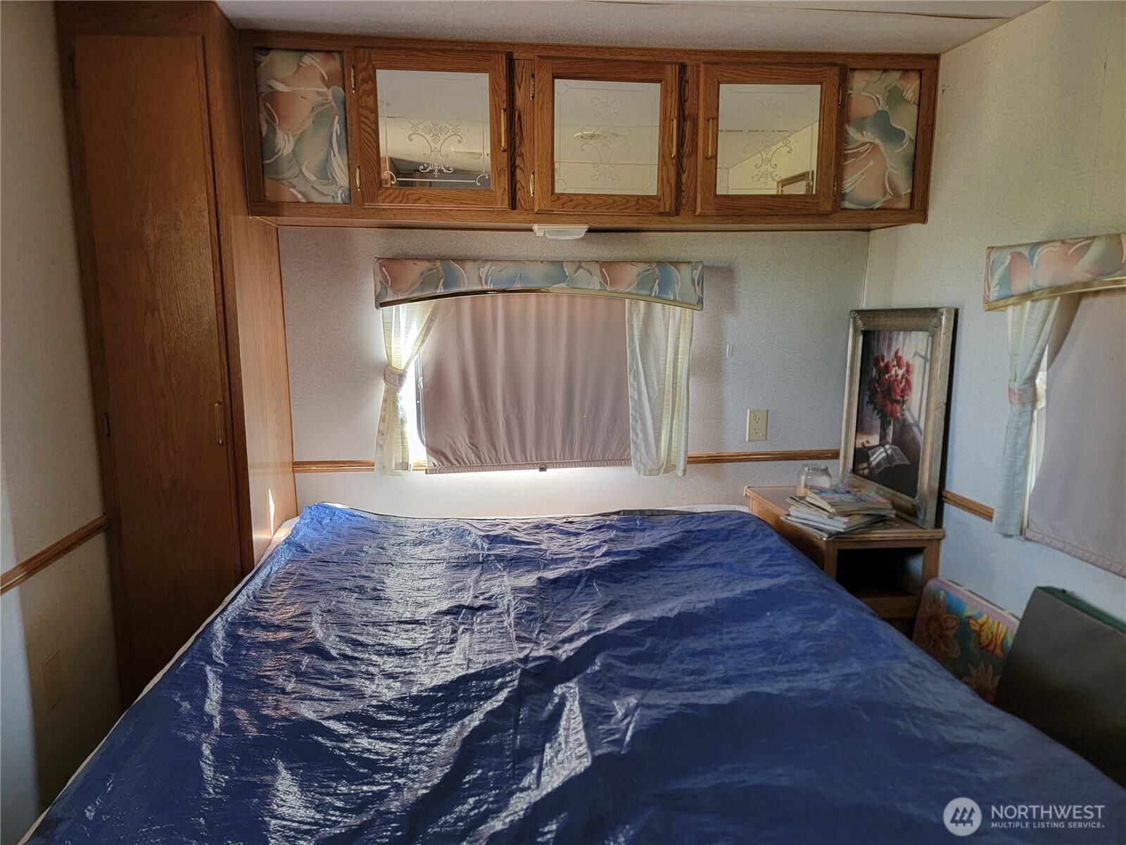 0 Mule Deer Road Republic, WA 99166 - Photo 21 of 23 a bedroom with a bed and a window