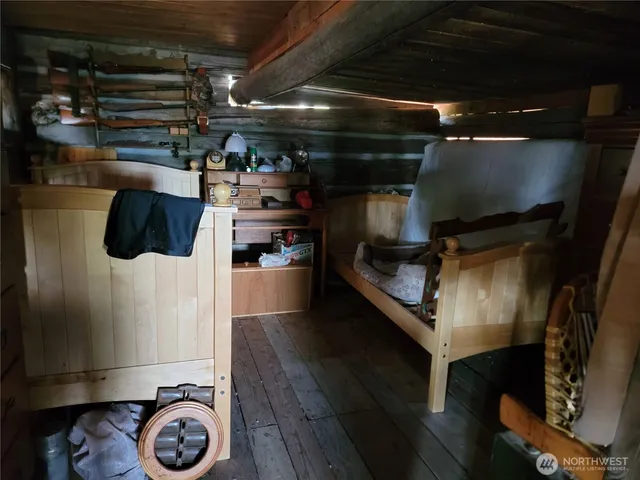 a kitchen with storage and utility