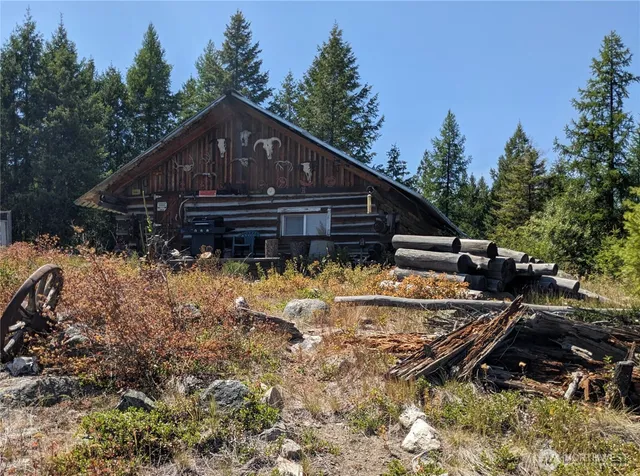 a house with trees in the background