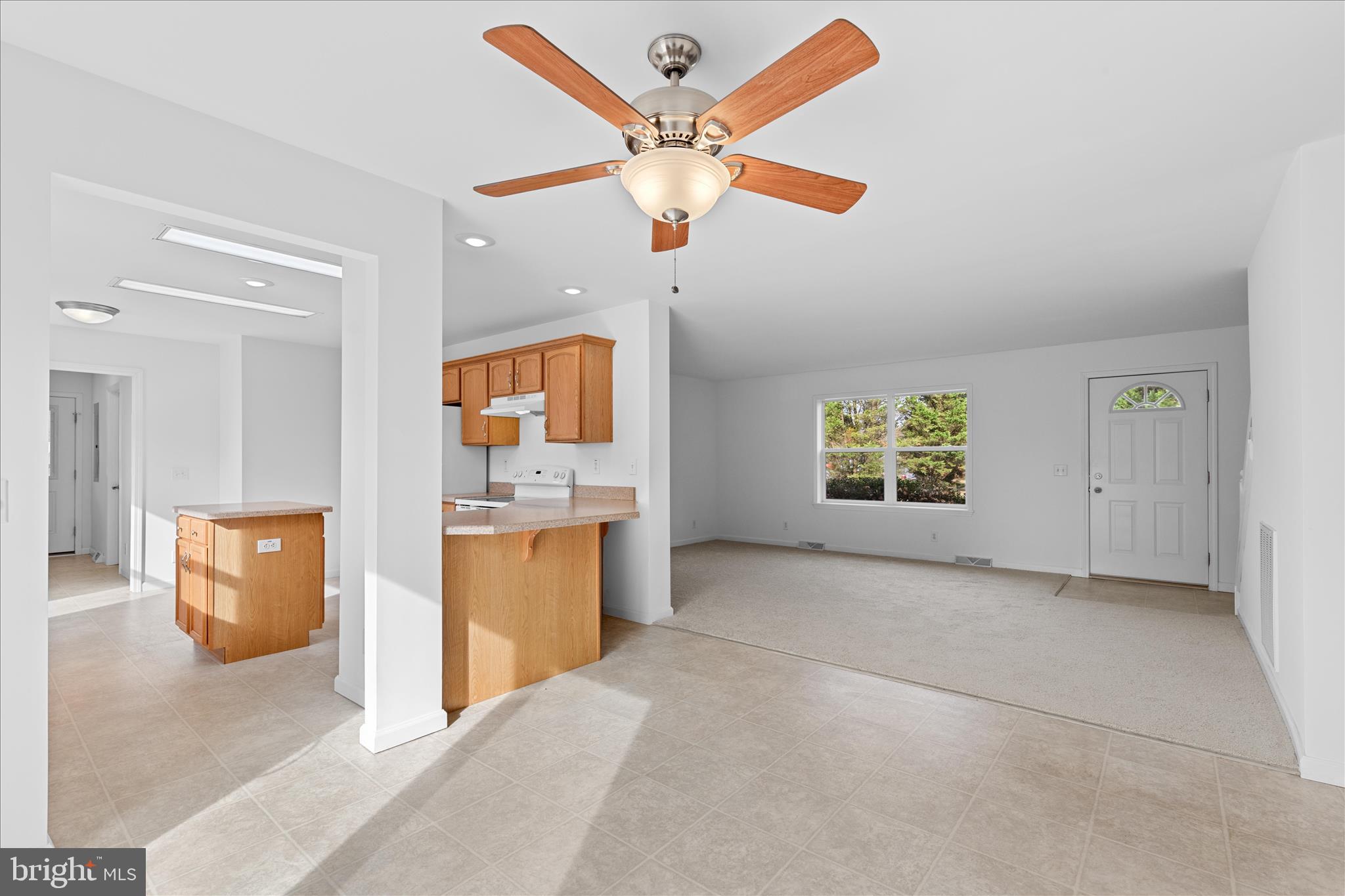 12454 Mirey Branch Road Laurel, DE 19956 - Photo 14 of 51 a view of an empty room with a kitchen