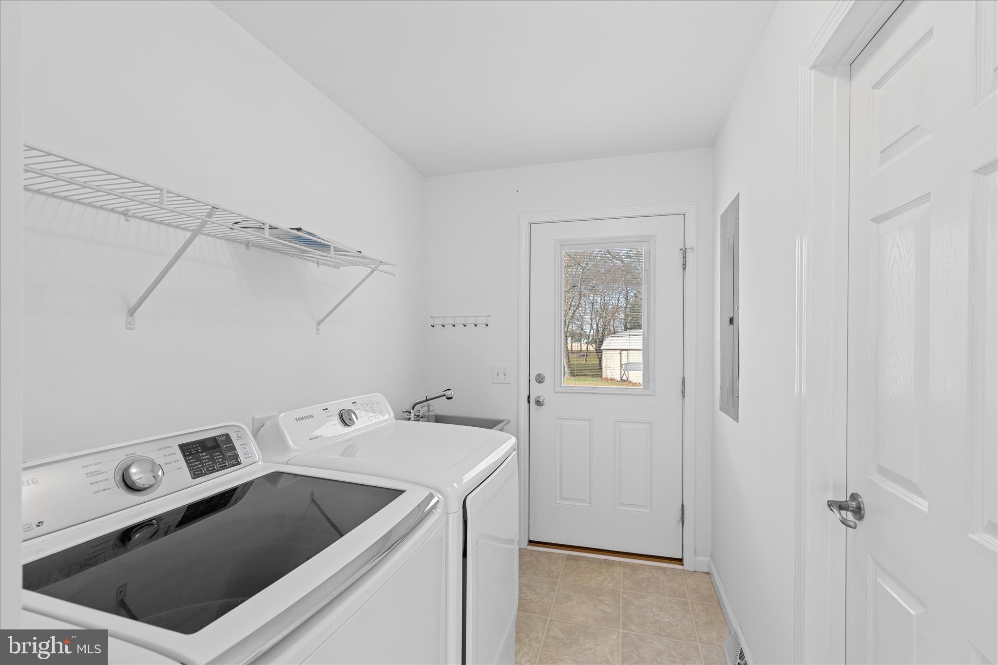 12454 Mirey Branch Road Laurel, DE 19956 - Photo 27 of 51 a utility room with dryer and washer