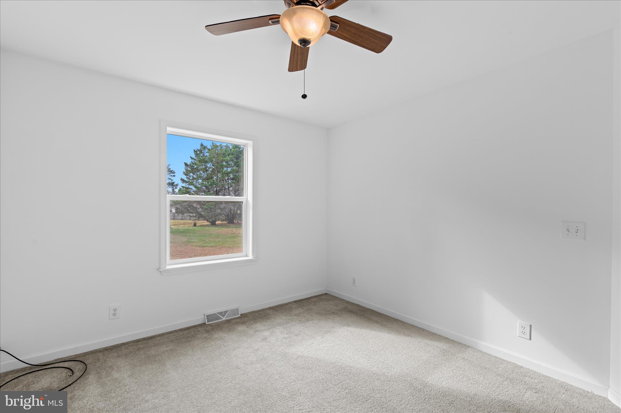 12454 Mirey Branch Road Laurel, DE 19956 - Photo 32 of 51 an empty room with a window