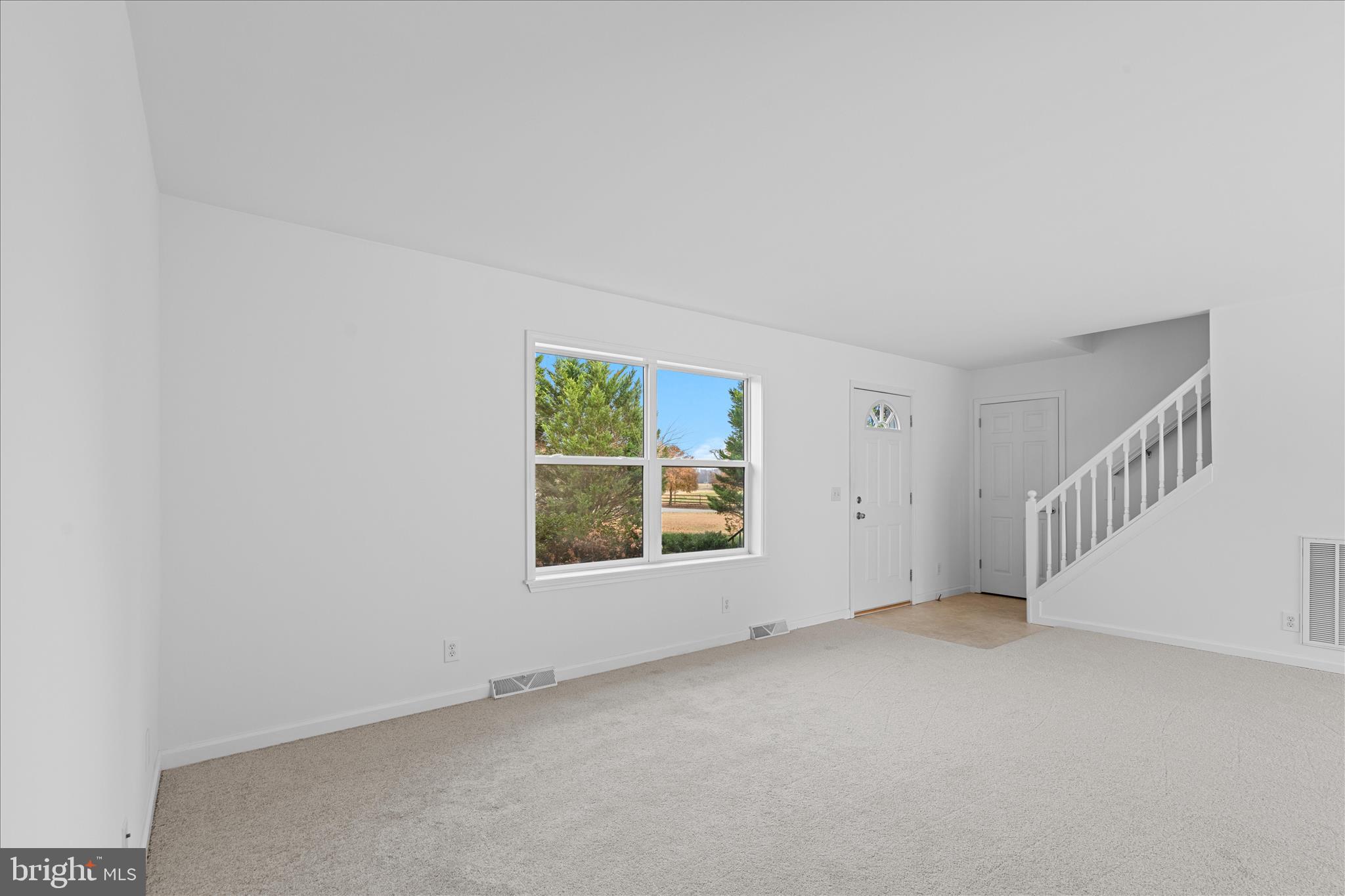 12454 Mirey Branch Road Laurel, DE 19956 - Photo 6 of 51 an empty room with a window