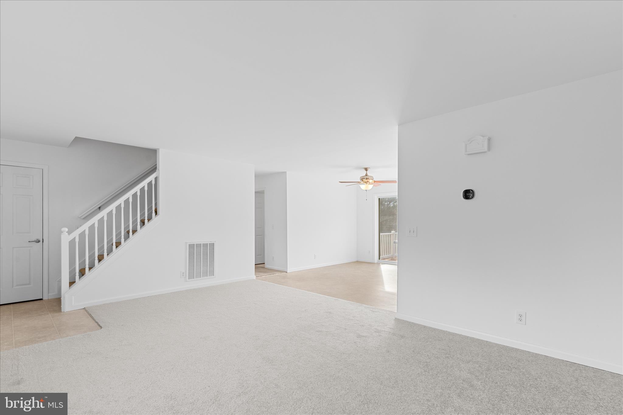 12454 Mirey Branch Road Laurel, DE 19956 - Photo 8 of 51 a view of an empty room with stairs