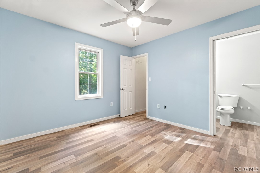 3704 Pease Road Midlothian, VA 23112 - Photo 18 of 50 a view of a room with a window and wooden floor