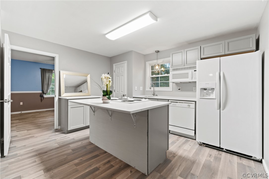 3704 Pease Road Midlothian, VA 23112 - Photo 24 of 50 a kitchen with white cabinets and white appliances