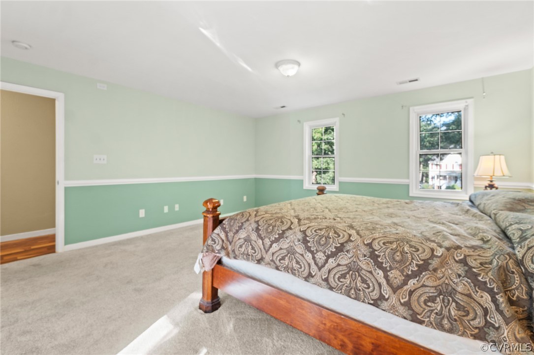 3704 Pease Road Midlothian, VA 23112 - Photo 35 of 50 a bedroom with a bed and closet with window