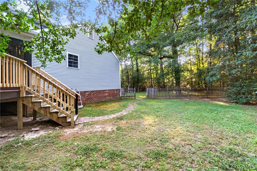 3704 Pease Road Midlothian, VA 23112 - Photo 48 of 50 a view of a house with backyard and a tree