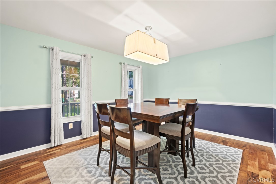 3704 Pease Road Midlothian, VA 23112 - Photo 6 of 50 a view of a dining room with furniture and wooden floor
