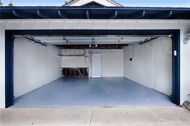 a view of room with a wooden floor