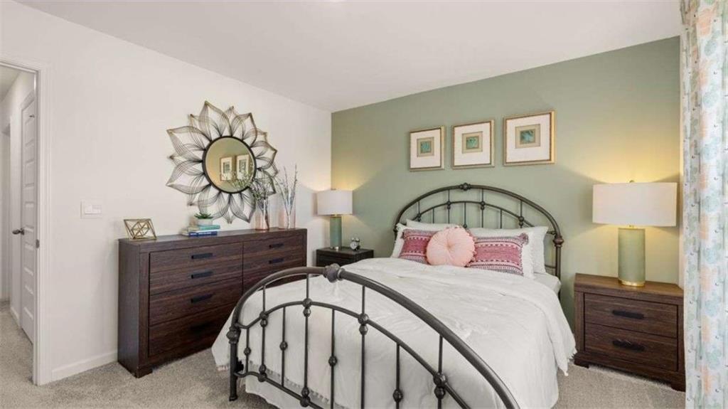 62 White Spruce Way Newnan, GA 30265 - Photo 38 of 41 a bedroom with a bed and a dresser