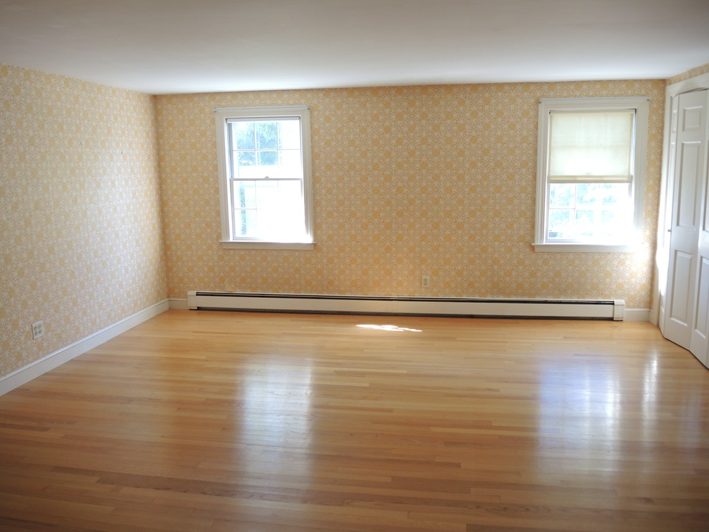 58 Avalon Road Needham, MA 02492 - Photo 20 of 22 a view of a room with wooden floor and window