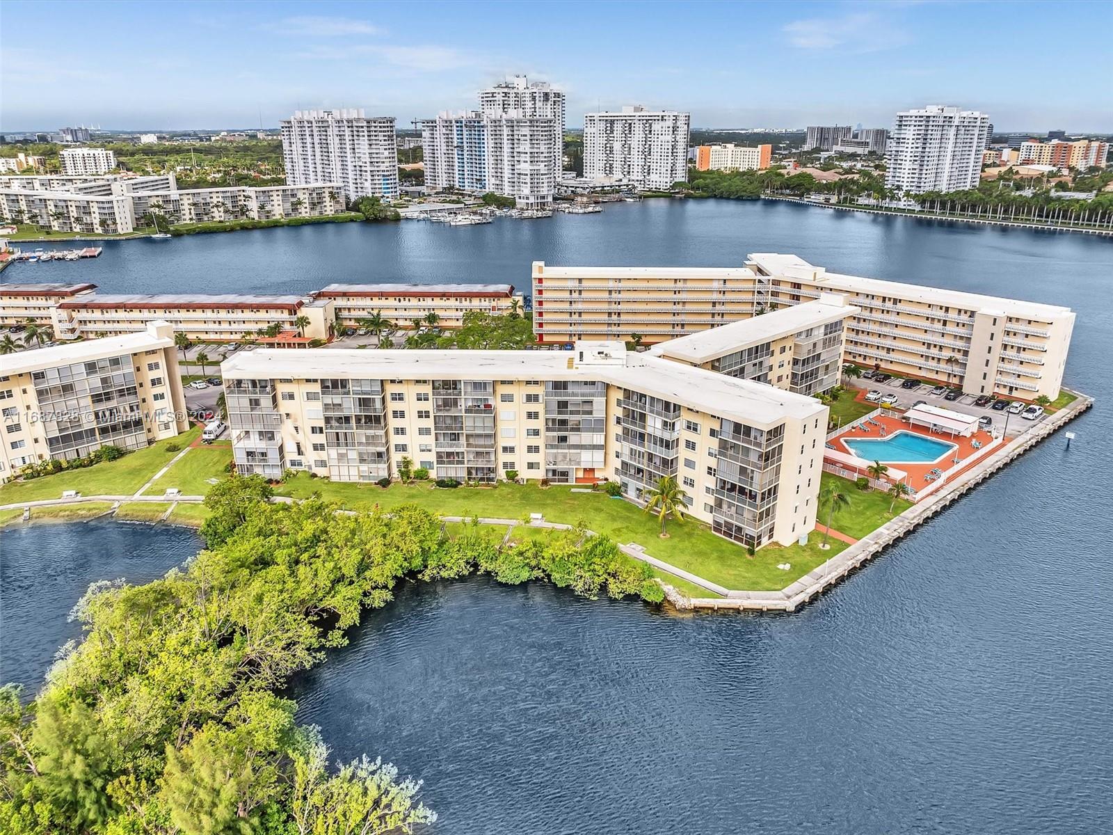 2980 Point E Drive, Unit D508 Aventura, FL 33160 - Photo 28 of 53 a view of a lake with tall building