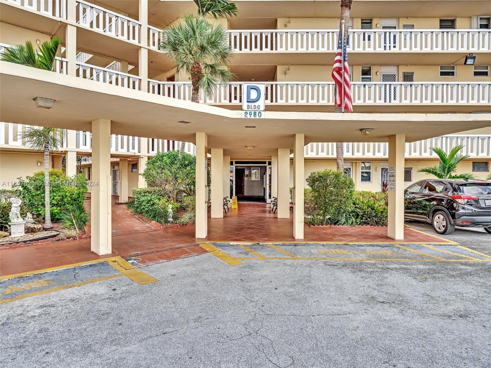 2980 Point E Drive, Unit D508 Aventura, FL 33160 - Photo 3 of 53 a view of a building with a porch