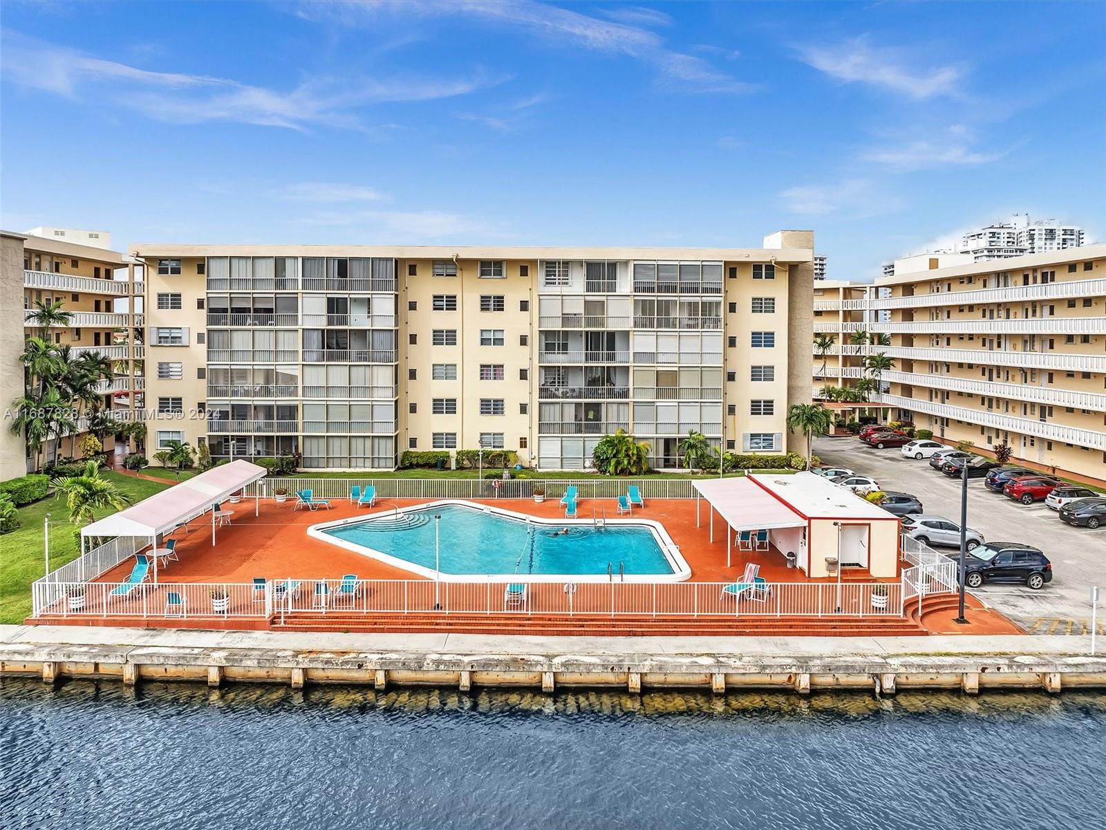 2980 Point E Drive, Unit D508 Aventura, FL 33160 - Photo 44 of 53 a view of swimming pool with building and city view
