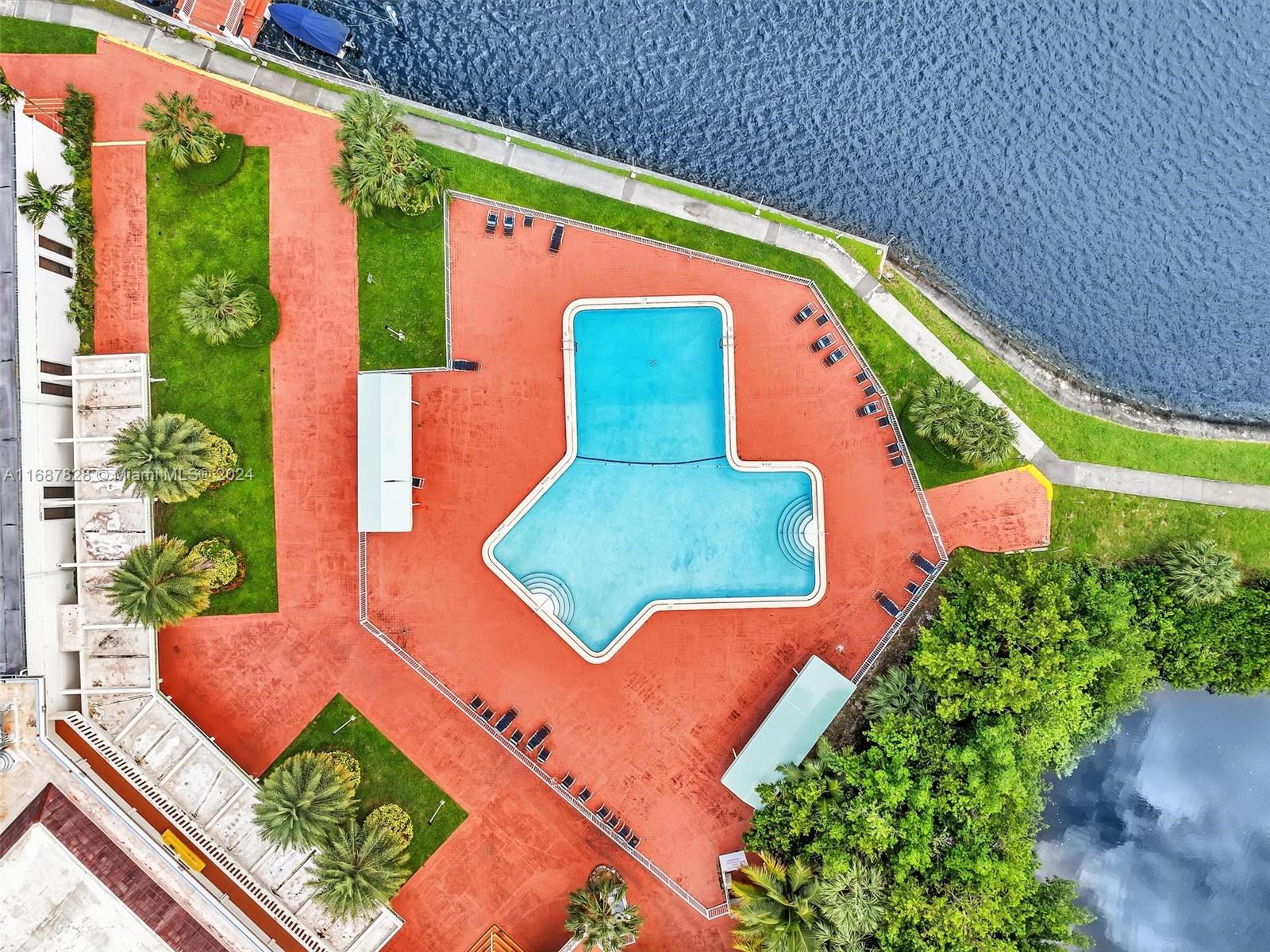 2980 Point E Drive, Unit D508 Aventura, FL 33160 - Photo 49 of 53 a view of an outdoor space with a swimming pool