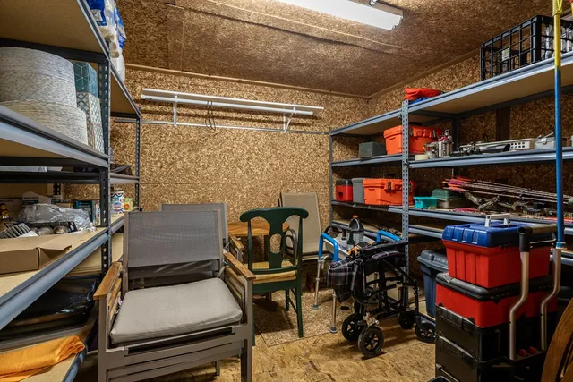 a view of a storage room with furniture