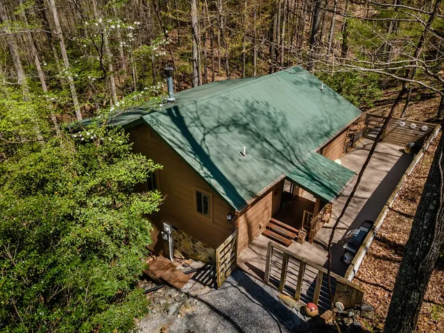a backyard of a house with seating space