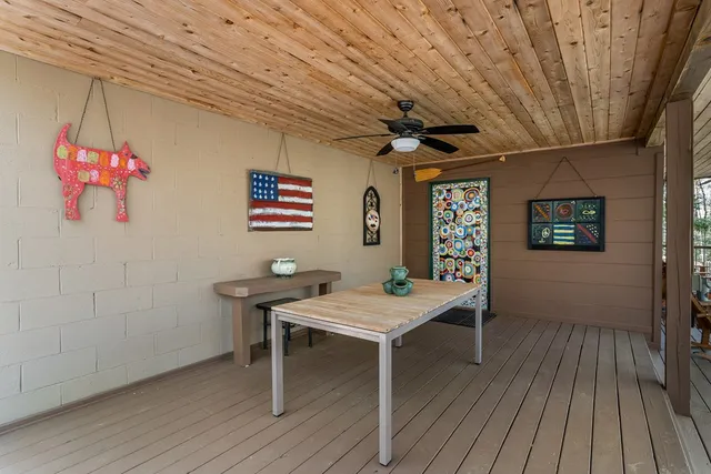 a view of a room with furniture wooden floor and window