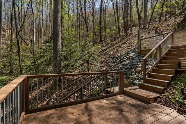 a view of entryway with wooden stairs